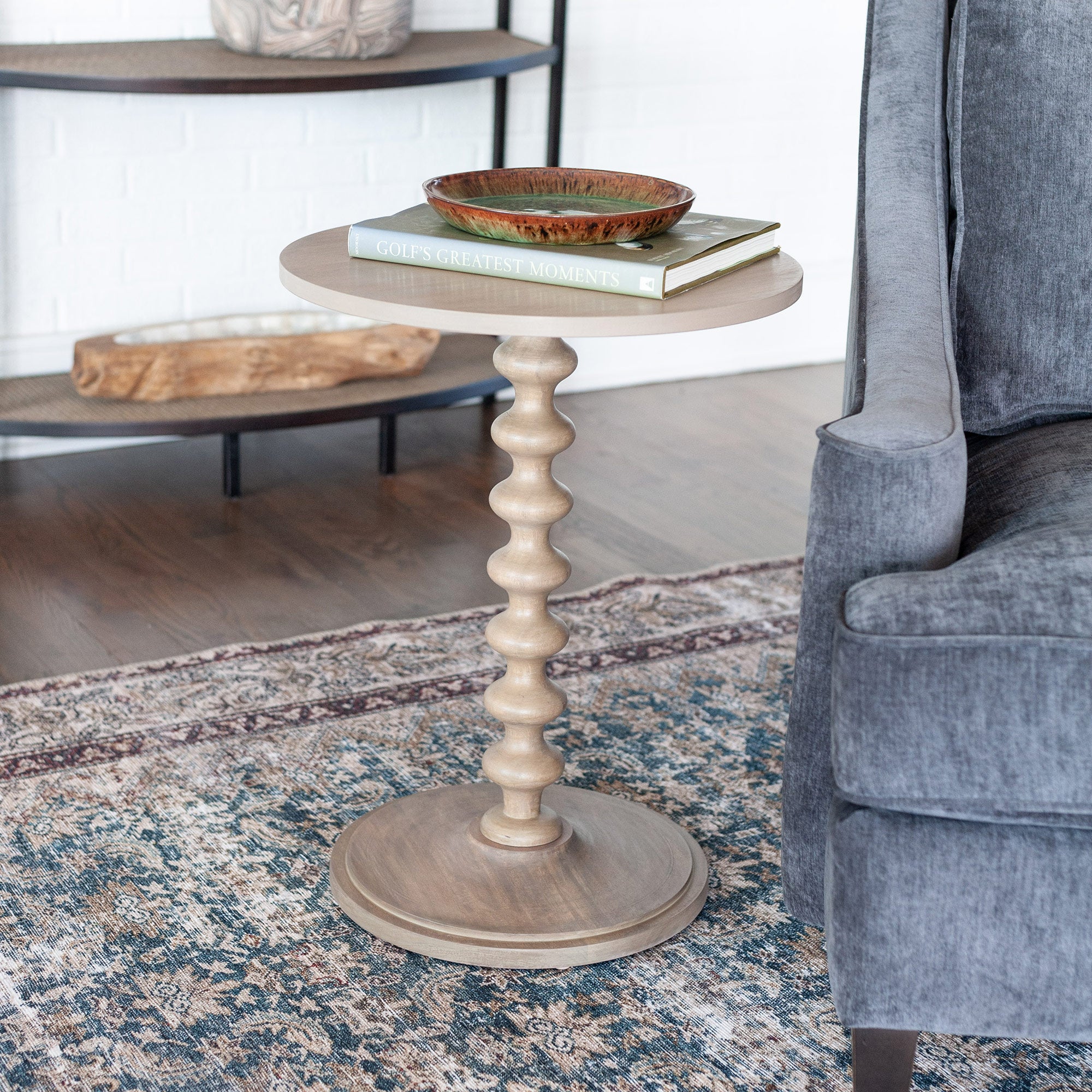 Grey pedestal side outlet table